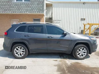 2018 Jeep Cherokee Latitude Plus z VIN 1C4PJMLX7JD515387, wystawiony jako IAAI lot #42459564 z przebiegiem 104 837 mil mil oraz . Historia ofert i sprzedaży dostępna na DreamBid. Obrazek 13.