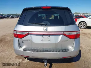 2013 Honda Odyssey Touring with VIN 5FNRL5H93DB076463, listed as a IAAI auction lot 41819994 with 188,911 mi miles. Bid and sale history available at carsss.com. Image 16.