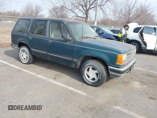 1992 Ford Explorer Eddie Bauer z VIN 1FMDU32X0NUE13629, wystawiony jako IAAI lot #41733918 z przebiegiem 97 999 mil mil oraz . Historia ofert i sprzedaży dostępna na DreamBid. Obrazek 1.