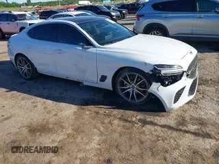 2022 Genesis G70 2.0T with VIN KMTG34TA2NU103990, listed as a IAAI auction lot 42302385 with 39,090 mi miles and . Bid and sale history available at DreamBid. Image 1.