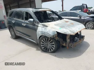 2023 Hyundai Palisade Calligraphy z VIN KM8R74GE2PU561200, wystawiony jako IAAI lot #41850409 z przebiegiem 21 599 mil mil oraz . Historia ofert i sprzedaży dostępna na DreamBid. Obrazek 1.