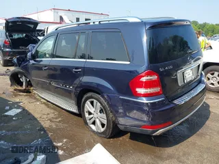 2011 Mercedes-Benz GL-Class GL 450 with VIN 4JGBF7BE8BA627367, listed as a IAAI auction lot 39992230 with 153,606 mi miles. Bid and sale history available at carsss.com. Image 3.