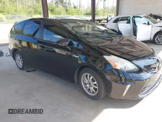 2014 Toyota Prius Two z VIN JTDZN3EUXE3330479, wystawiony jako IAAI lot #42327921 z przebiegiem 145 747 mil mil oraz . Historia ofert i sprzedaży dostępna na DreamBid. Obrazek 1.