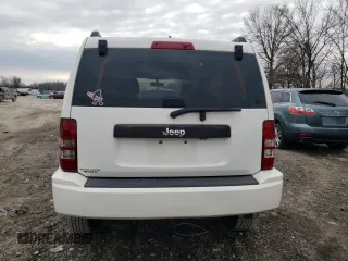 2010 Jeep Liberty Sport with VIN 1J4PP2GK9AW133958, listed as a Copart auction lot 47265675 with 124,466 mi miles and Salvage Title. Bid and sale history available at DreamBid. Image 6.