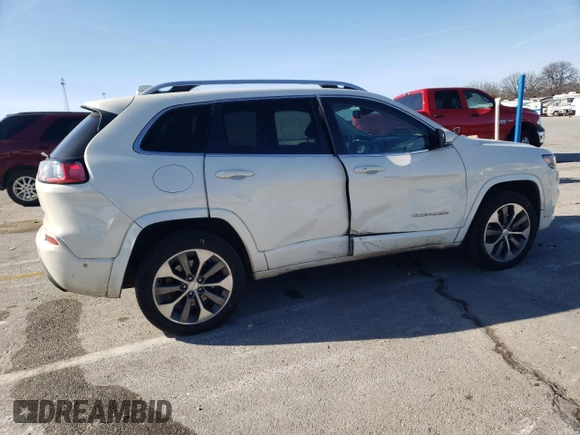 2019 Jeep Cherokee Overland with VIN 1C4PJMJN3KD173830, listed as a Copart auction lot 87229794 with 82,433 mi miles and Salvage title. Bid and sale history available at DreamBid. Image 3.