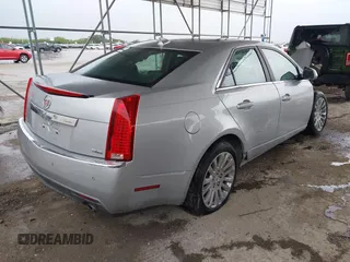 2013 Cadillac CTS Premium z VIN 1G6DP5E3XD0128204, wystawiony jako IAAI lot #42165101 z przebiegiem 88 425 mil mil oraz . Historia ofert i sprzedaży dostępna na DreamBid. Obrazek 4.