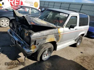 1988 Ford Bronco z VIN 1FMCU14T2JUA39593, wystawiony jako Copart lot #76556764 z przebiegiem Nie podano mil oraz Szkoda całkowita • Salvage title. Historia ofert i sprzedaży dostępna na DreamBid. Obrazek 1.
