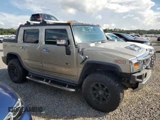 2005 Hummer H2 SUT with VIN 5GRGN22U85H110412, listed as a Copart auction lot 73856704 with 262,954 mi miles and Salvage Title. Bid and sale history available at carsss.com. Image 4.