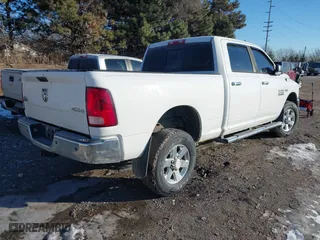 2014 Ram 2500 SLT with VIN 3C6TR5DT2EG158273, listed as a IAAI auction lot 41351124 with 247,499 mi miles. Bid and sale history available at carsss.com. Image 4.