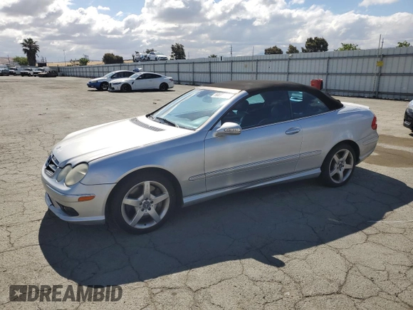 2005 Mercedes-Benz CLK 500 with VIN WDBTK75J85F153391, listed as a Copart auction lot 56691935 with 79,993 mi miles and Salvage title. Bid and sale history available at DreamBid. Image 1.