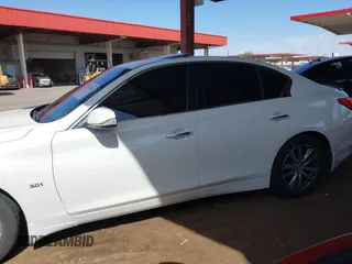 2016 Infiniti Q50 3.0t Premium with VIN JN1EV7AP4GM303705, listed as a IAAI auction lot 41957748 with 122,839 mi miles. Bid and sale history available at carsss.com. Image 14.