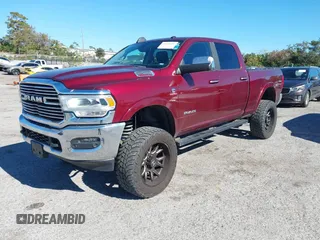 2019 Ram 2500 Laramie with VIN 3C6UR5FL1KG537617, listed as a IAAI auction lot 41076191 with 82,818 mi miles. Bid and sale history available at carsss.com. Image 2.