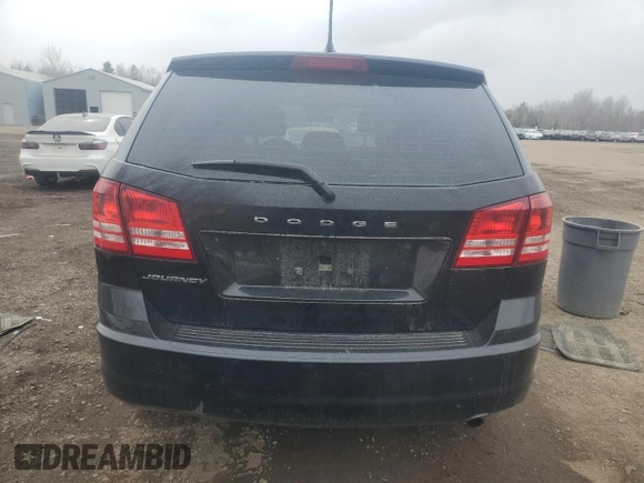 2015 Dodge Journey American Value with VIN 3C4PDCAB3FT520452, listed as a Copart auction lot 52591255 with 299,871 mi miles and Clean Title. Bid and sale history available at DreamBid. Image 6.