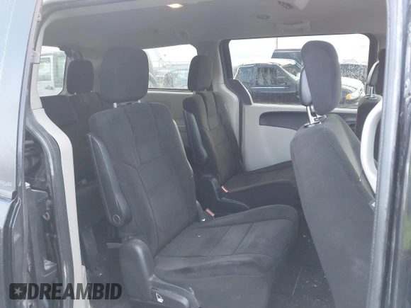 2012 Dodge Grand Caravan SXT with VIN 2C4RDGCG3CR318900, listed as a IAAI auction lot 41145958 with 201,117 mi miles and . Bid and sale history available at DreamBid. Image 8.