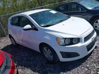 2016 Chevrolet Sonic LT with VIN 1G1JC6SH2G4134831, listed as a IAAI auction lot 41983302 with 85,828 mi miles. Bid and sale history available at carsss.com. Image 1.
