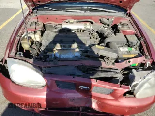 2000 Hyundai Elantra GLS z VIN KMHJF35F9YU919481, wystawiony jako Copart lot #79717924 z przebiegiem 137 918 mil mil oraz Szkoda całkowita • Salvage title. Historia ofert i sprzedaży dostępna na DreamBid. Obrazek 11.