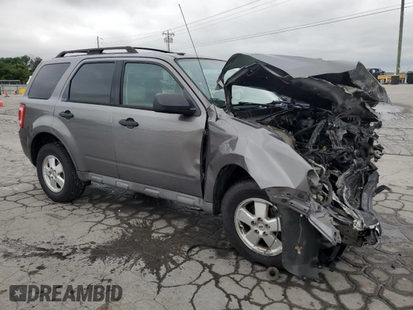 2012 Ford Escape XLT with VIN 1FMCU0D73CKA20143, listed as a Copart auction lot 63111075 with 136,942 mi miles and Salvage title. Bid and sale history available at DreamBid. Image 4.