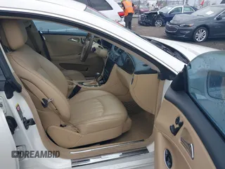 2009 Mercedes-Benz CLS-Class 5.5L with VIN WDDDJ72X79A140979, listed as a IAAI auction lot 41802317 with 195,968 mi miles. Bid and sale history available at carsss.com. Image 5.