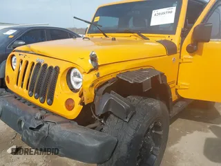 2012 Jeep Wrangler Sport with VIN 1C4AJWAG0CL128595, listed as a IAAI auction lot 42048590 with 133,085 mi miles and . Bid and sale history available at DreamBid. Image 6.