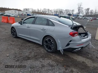 2024 Kia K5 GT-Line z VIN 5XXG64J22RG228095, wystawiony jako IAAI lot #41888510 z przebiegiem 11 927 mil mil oraz . Historia ofert i sprzedaży dostępna na DreamBid. Obrazek 3.