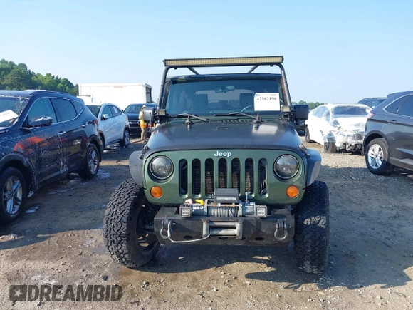 2007 Jeep Wrangler Unlimited X с VIN 1J4GA39197L115109, выставлен на аукционе IAAI как лот 42582190 с пробегом 141 080 миль миль и . История ставок и продаж доступна на DreamBid. Изображение 12.