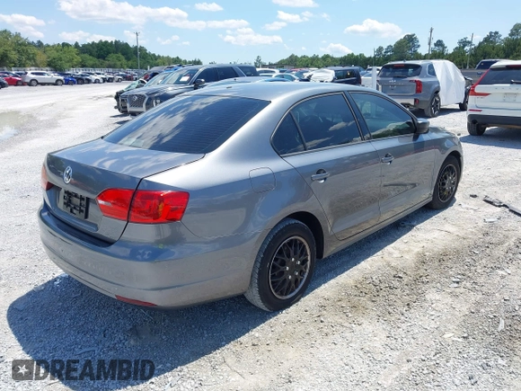 2014 Volkswagen Jetta S z VIN 3VW2K7AJ6EM253571, wystawiony jako IAAI lot #42186222 z przebiegiem 171 518 mil mil oraz . Historia ofert i sprzedaży dostępna na DreamBid. Obrazek 4.