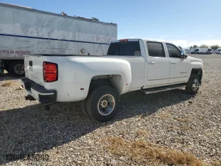 2015 GMC Sierra 3500HD Denali with VIN 1GT424E8XFF668587, listed as a Copart auction lot 87415324 with 125,606 mi miles and Salvage Title. Bid and sale history available at carsss.com. Image 3.