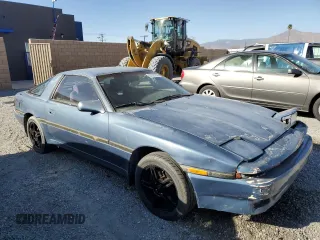 1986 Toyota Supra z VIN JT2MA70L2G0012221, wystawiony jako Copart lot #87328804 z przebiegiem 142 252 mil mil oraz Szkoda całkowita • Salvage title. Historia ofert i sprzedaży dostępna na DreamBid. Obrazek 4.