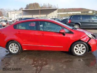 2015 Kia Rio LX with VIN KNADM4A30F6443225, listed as a IAAI auction lot 40705431 with 141,698 mi miles. Bid and sale history available at carsss.com. Image 13.