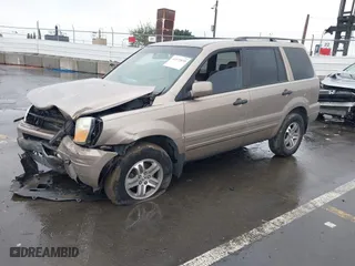 2004 Honda Pilot EX with VIN 2HKYF18604H582741, listed as a IAAI auction lot 41572039 with 225,101 mi miles. Bid and sale history available at carsss.com. Image 17.