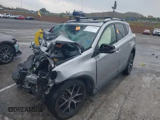 2018 Toyota RAV4 SE with VIN JTMNFREV1JD121028, listed as a IAAI auction lot 42408050 with Not provided miles and . Bid and sale history available at DreamBid. Image 2.