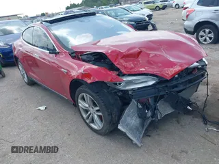 2014 Tesla Model S 60 z VIN 5YJSA1H14EFP63897, wystawiony jako IAAI lot #42713272 z przebiegiem Nie podano mil oraz . Historia ofert i sprzedaży dostępna na DreamBid. Obrazek 1.