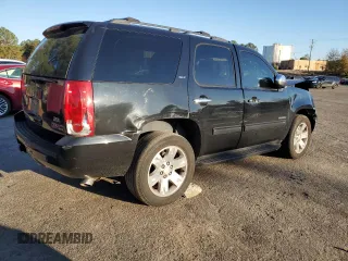 2011 GMC Yukon SLT with VIN 1GKS1CE01BR391954, listed as a Copart auction lot 82570594 with 0 mi miles and Salvage Title. Bid and sale history available at carsss.com. Image 3.