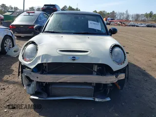 2014 MINI Hardtop S with VIN WMWXM7C57ET987122, listed as a IAAI auction lot 41780127 with 78,567 mi miles and . Bid and sale history available at DreamBid. Image 13.