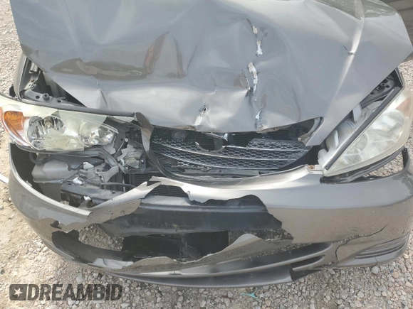 2004 Toyota Camry LE z VIN 4T1BE32K74U848946, wystawiony jako Copart lot #56030995 z przebiegiem Nie podano mil oraz Szkoda całkowita • Salvage title. Historia ofert i sprzedaży dostępna na DreamBid. Obrazek 11.