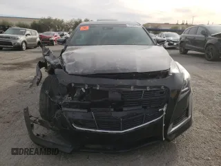 2014 Cadillac CTS Premium AWD z VIN 1G6AZ5SX7E0158072, wystawiony jako Copart lot #79503204 z przebiegiem 86 777 mil mil oraz Szkoda całkowita • Salvage title. Historia ofert i sprzedaży dostępna na DreamBid. Obrazek 5.