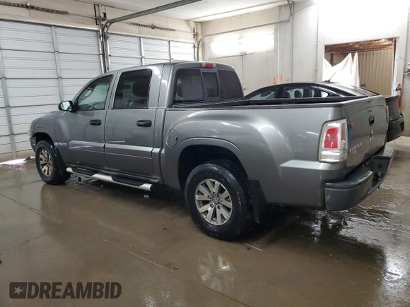 2008 Mitsubishi Raider LS z VIN 1Z7HC28KX8S572256, wystawiony jako Copart lot #76278594 z przebiegiem 139 373 mil mil oraz Szkoda całkowita • Salvage title. Historia ofert i sprzedaży dostępna na DreamBid. Obrazek 2.