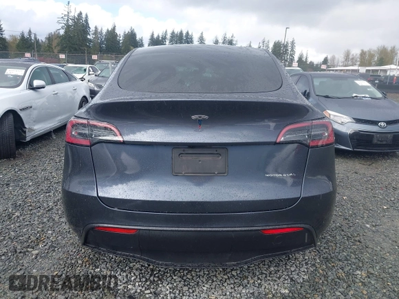 2023 Tesla Model Y Long Range with VIN 7SAYGAEE4PF871281, listed as a IAAI auction lot 41989805 with 15,501 mi miles. Bid and sale history available at carsss.com. Image 17.