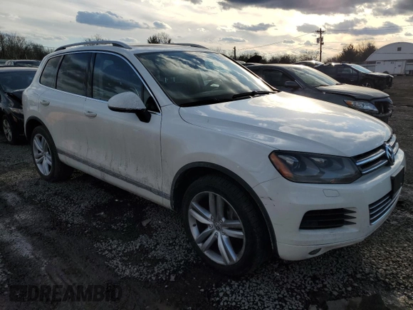 2012 Volkswagen Touareg Sport z VIN WVGFK9BP6CD002427, wystawiony jako Copart lot #42576335 z przebiegiem 167 936 mil mil oraz Szkoda całkowita • Salvage title. Historia ofert i sprzedaży dostępna na DreamBid. Obrazek 4.