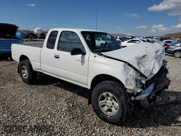1999 Toyota Tacoma with VIN 4TAWN72N2XZ434256, listed as a Copart auction lot 49873685 with 285,424 mi miles and Salvage title. Bid and sale history available at DreamBid. Image 4.