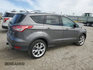 2013 Ford Escape Titanium z VIN 1FMCU9J90DUA72264, wystawiony jako Copart lot #49906445 z przebiegiem 126 527 mil mil oraz Szkoda całkowita • Salvage title. Historia ofert i sprzedaży dostępna na DreamBid. Obrazek 3.