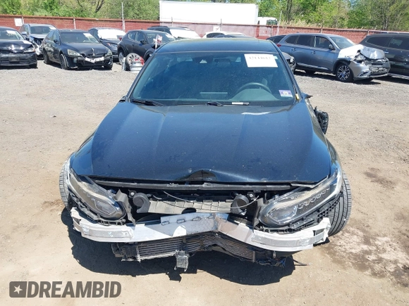 2020 Honda Accord Sport with VIN 1HGCV2F32LA001310, listed as a IAAI auction lot 42144612 with 54,728 mi miles and . Bid and sale history available at DreamBid. Image 12.