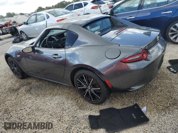2024 Mazda MX-5 Miata Grand Touring z VIN JM1NDAM73R0603254, wystawiony jako Copart lot #74551704 z przebiegiem Nie podano mil oraz Nie do naprawy • Non repairable. Historia ofert i sprzedaży dostępna na DreamBid. Obrazek 2.