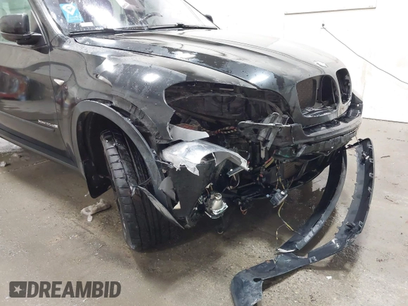 2012 BMW X5 35d z VIN 5UXZW0C58CL671740, wystawiony jako IAAI lot #41158203 z przebiegiem 97 451 mil mil oraz . Historia ofert i sprzedaży dostępna na DreamBid. Obrazek 6.