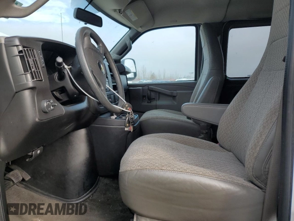 2018 Chevrolet Express Passenger LT with VIN 1GAZGPFG3J1245055, listed as a Copart auction lot 87807965 with 106,634 mi miles and Salvage title. Bid and sale history available at DreamBid. Image 7.