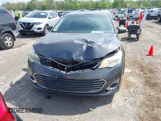 2014 Toyota Avalon Limited with VIN 4T1BK1EB3EU087911, listed as a IAAI auction lot 42070580 with 191,687 mi miles. Bid and sale history available at carsss.com. Image 12.
