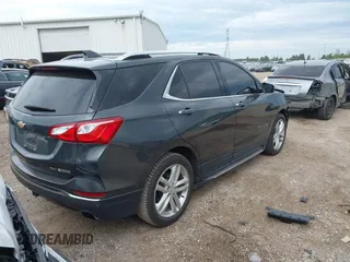 2018 Chevrolet Equinox Premier with VIN 2GNAXWEX5J6202082, listed as a IAAI auction lot 40008794 with 110,735 mi miles and . Bid and sale history available at carsss.com. Image 4.