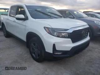 2021 Honda Ridgeline RTL-E with VIN 5FPYK3F78MB005044, listed as a Copart auction lot 63120882 with Not provided miles and . Bid and sale history available at DreamBid. Image 9.
