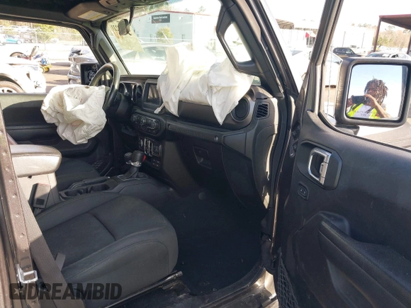 2022 Jeep Wrangler Unlimited Sport with VIN 1C4HJXDG1NW167066, listed as a IAAI auction lot 41572221 with 48,356 mi miles and . Bid and sale history available at DreamBid. Image 5.