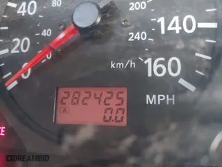2000 Nissan Maxima GXE with VIN JN1CA31DXYT509314, listed as a IAAI auction lot 41762697 with 282,425 mi miles. Bid and sale history available at carsss.com. Image 7.